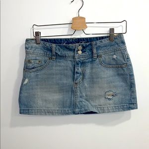 Distressed jean skirt. Size 2.